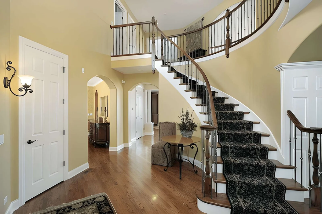 How Do Designers Create Beautiful Rooms Around Staircases?